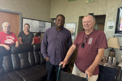 The Vicksburg ARC operated Field Day from the old passenger terminal of the Vicksburg Airport. In the photo Vicksburg Mayor-Elect Willis Thompson discuses Ham Radio with W5XX with KG5YEE and KC5ICO looking on from the background. (photo provided by W5WAF)