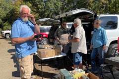 The 2022 ARRL Day in the Park was held at McGee Park in Starkville hosted by the Magnolia, MSU, Lowndes County, and Sundancer ARCs.  In the photo KG5PBJ checks out his new 2M Rig found in the Flea Market. (photo provided by XYL of K5FLU)