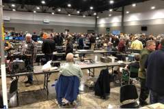 Five hundred plus Hams descended on the Trademart in Jackson for the long awaited Capital City Hamfest.  After last year's Hamfest had to be cancelled due to Covid, Hams were "Hamfest hungry." In the photo taken from the prize table, many Hams wandered through the flea market renewing old acquaintances and looking for that bargain of a life time. (photo provided by K5UZ)