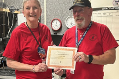 Each month QST publishes a listing of Hams who have qualified for the Public Service Honor Roll (PSHR). The PSHR recognizes Hams who give a little extra each month by participating in public service events, emergency responses, on-the-air traffic handling, and helping the Section with various jobs though an appointment. In the photo Harrison County Emergency Coordinator WX5RJ (right) presents the PSHR Commendation Certificate to AE5MI (left), who qualified by making PSHR for a year.(photo provided by WX5RJ)