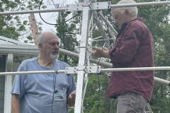 Summer is here and time to go to work on the Antenna farm.  In the photo KI5ZNE and KK5ED put the final touches on a new Tennadyne Log Array. (photo provided by AF5OQ and KC5IBO)