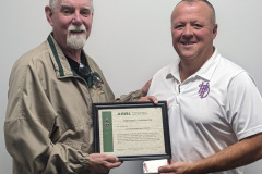 In the photo Golden Triangle District Emergency Coordinator (EC) Allen McBroom, AG5ND (left), presents Jonathan Blankenship, KD5KMO (right), with his certificate and name badge naming him as the new Chickasaw County EC for ARRL.  Jonathan also serves as the Fire Chief for Houston, MS.