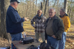 On the third Saturday of each month members of Central Mississippi ARA (CMARA) and members of ARES meet at a local park to have fun, fellowship, and practice operations in preparation for emergencies. They met at Crystal Lake near Florence in December. In the photo K5RAP (left) discusses how the antenna raising should proceed with KG5SQZ, KI5TOL, and W5PFR looking on. (photo provided by K0UPW)