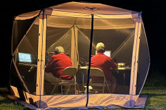 Lawrence County has not been on the air for a long time. Three hardy Magnolia DX Association Members set up portable at the Atwood Water Park in Monticello for the Mississippi QSO Party. In the photo N5GD and WG5GK work the pile ups from their five star hotel. (photo provided by K5IJ)