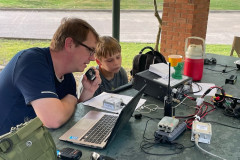 The Alcorn County ARES operated from the Mississippi Welcome Center on US 45.  In the photo W5OA and Jr Op Iliam run the pileups on SSB. (Photo provided by K5WHB)