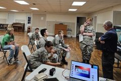 George County ARES recently hosted the local Civil Air Patrol Squadron for a briefing on Ham Radio.  In the photo a CAP cadet talks with K5YVA in Sumrall on the DMR repeater system in George County about being a cadet and his future plans regarding a career. (Photo provided by KD4VVZ)
